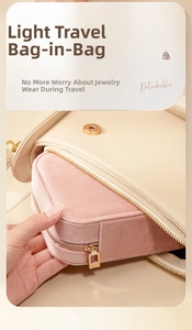 Pink velvet portable jewelry travel case shown as a handbag organizer with gold zipper