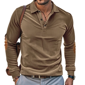 Detail showing brown corduroy polo shirt with suede elbow patches and ribbed texture