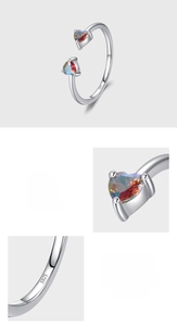 Detail of S925 sterling silver ring featuring two colorful heart-shaped zircon stones
