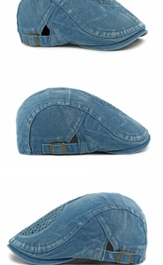 Detail showing vintage blue washed denim cap with metal buckle and woven vent design