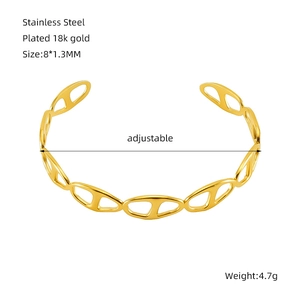Close-up showing 8x1.3mm adjustable 18K gold-plated stainless steel pig nose cuff bracelet