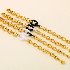 Vintage irregular titanium steel bracelet with gold, black, and white resin accents