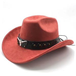 Detail of red-brown suede cowboy hat with metallic bull head and rivet decoration