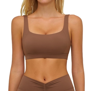 Brown brushed yoga sports bra with U-neck and wide straps shown on a model