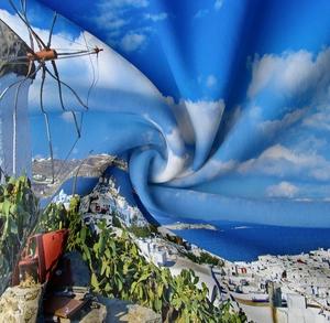 Detail of Santorini tapestry fabric with spiral fold showing soft texture and vibrant print