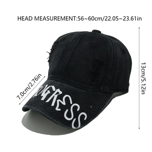Detail view of washed black denim baseball cap with PROGRESS text and size specifications
