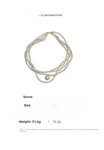 Detail showing multi-layer baroque pearl necklace specs, 46.2cm length with golden clasp