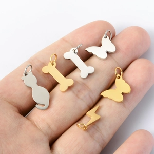 Stainless steel animal pendants including cat and butterfly charms in gold and silver