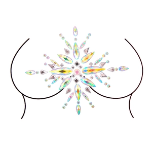Detailed pattern of iridescent acrylic chest jewels and crystals for music festivals