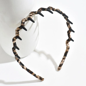 Serre-tête pelucheux à motif léopard marron avec dents antidérapantes pour femmes