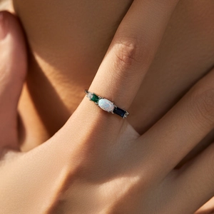 Elegant S925 sterling silver ring featuring an oval opal and colorful accent gemstones