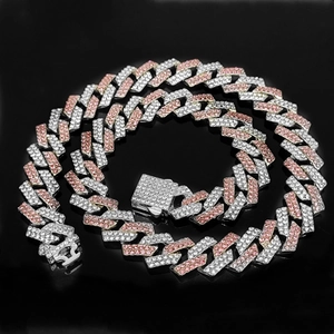 Detail of two-tone hip hop cuban link chain with silver and rose gold pavé crystals