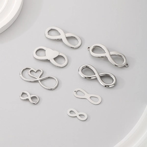Infinity symbol pendants and heart charms in silver stainless steel for DIY jewelry