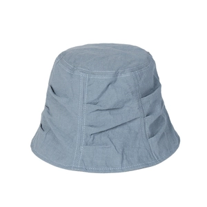 Linen bucket hat in dusty blue with pleated design and lightweight breathable fabric