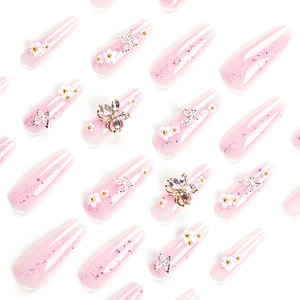 Pink glitter long coffin press-on nails with 3D floral and butterfly ornaments