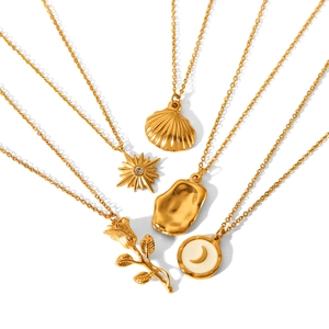 Detailed collection of five golden stainless steel necklaces with various trendy pendants