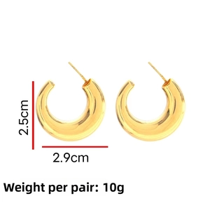 Detail view of 18k gold plated chunky C-hoop earrings with 2.5cm height dimension markers
