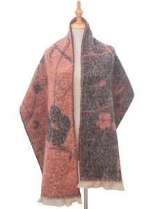 Close-up of dual-color floral jacquard scarf with fringe in grey and coral tones