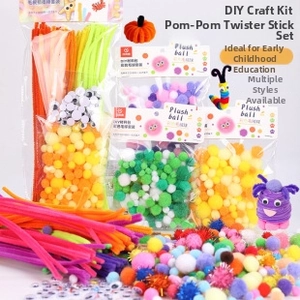 Close-up of colorful DIY craft set with plush pipe cleaners, pom-poms and googly eyes