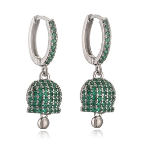 Detail of silver bell earrings with micro-paved green crystals and hanging metal sphere