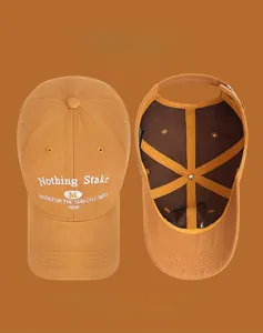 Detail of embroidered American style baseball cap with various color options shown