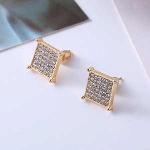 Macro shot of gold-plated square stud earrings featuring dense pavé-set clear crystals