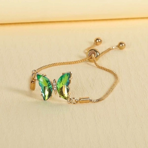Adjustable gold chain bracelet featuring gradient crystal butterfly and sparkling accents