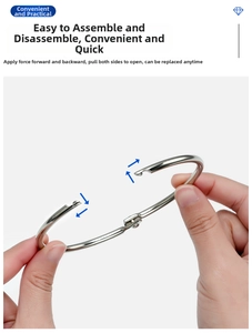 Close-up showing how to open the silver metal binder ring for DIY albums and notebooks
