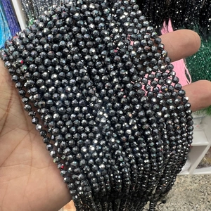 Macro shot of black Terahertz multifaceted faceted loose beads for jewelry making