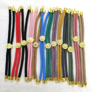 Detailed flat lay of adjustable 3mm Milan cord bracelets with gold Tree of Life charms
