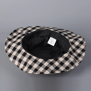 Vintage checkered linen bucket hat for women with sun protection and stylish flat top