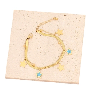Pulsera de doble cadena de serpiente dorada con dijes de estrellas e incrustación turquesa