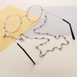 Silver stainless steel eyeglass chain with heart shapes and evil eye beads charms
