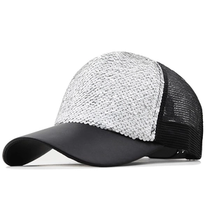 Detail of silver sequins on black mesh baseball cap with curved brim and breathable back