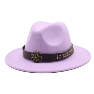 Detail of purple fedora hat with brown leather band, metallic flower and rivets