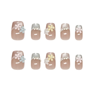 Cat eye press-on nails with handmade 3D floral accents and pearls in a French sweet style