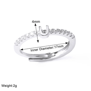 Detail view of silver letter U ring showing 17mm inner diameter and 4mm letter height