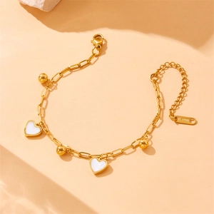 Gold stainless steel chain bracelet with white heart charms and gold spherical beads