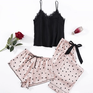 Three-piece faux silk sleepwear set with black lace camisole and pink polka dot pants