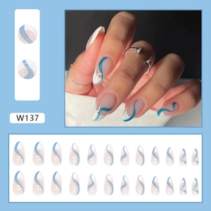 Teardrop press-on nails with blue glitter stripes and white translucent almond shape