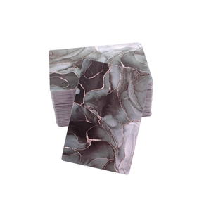 Detail of marble pattern jewelry display cards with elegant rose gold metallic veins