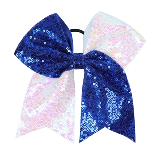 Détail du nœud de cheerleading à paillettes bleu et blanc avec élastique noir