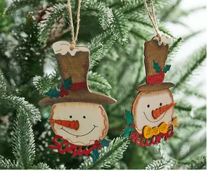 Detail of vintage hand-painted wooden snowman ornaments with Snow and Welcome signs