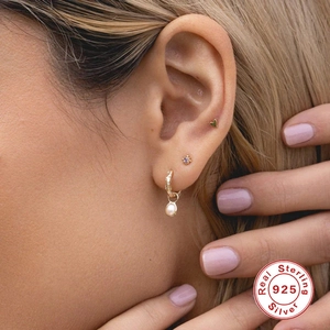 S925 sterling silver gold plated earrings set with marquise diamond pearl and purple gem