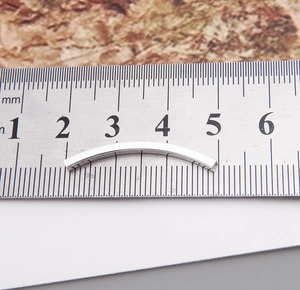 Macro view of S925 sterling silver square tube bead showing its 45mm length on a ruler