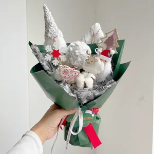 Handheld Christmas bouquet with Santa, reindeer and Merry Christmas ribbon for gift