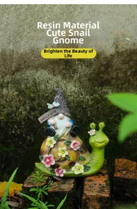 Detail of waterproof resin gnome riding a snail with solar LED flowers and Welcome sign