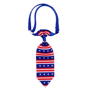 Detail of American flag pattern pet tie with stars stripes and white plastic buckle