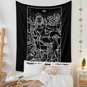 Bohemian tarot tapestry featuring the Empress III skeleton design over a cozy bedroom bed