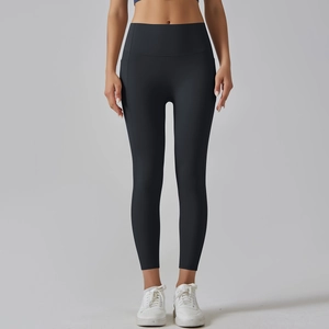 Front view of high waisted seamless black yoga pants with tummy control compression fit